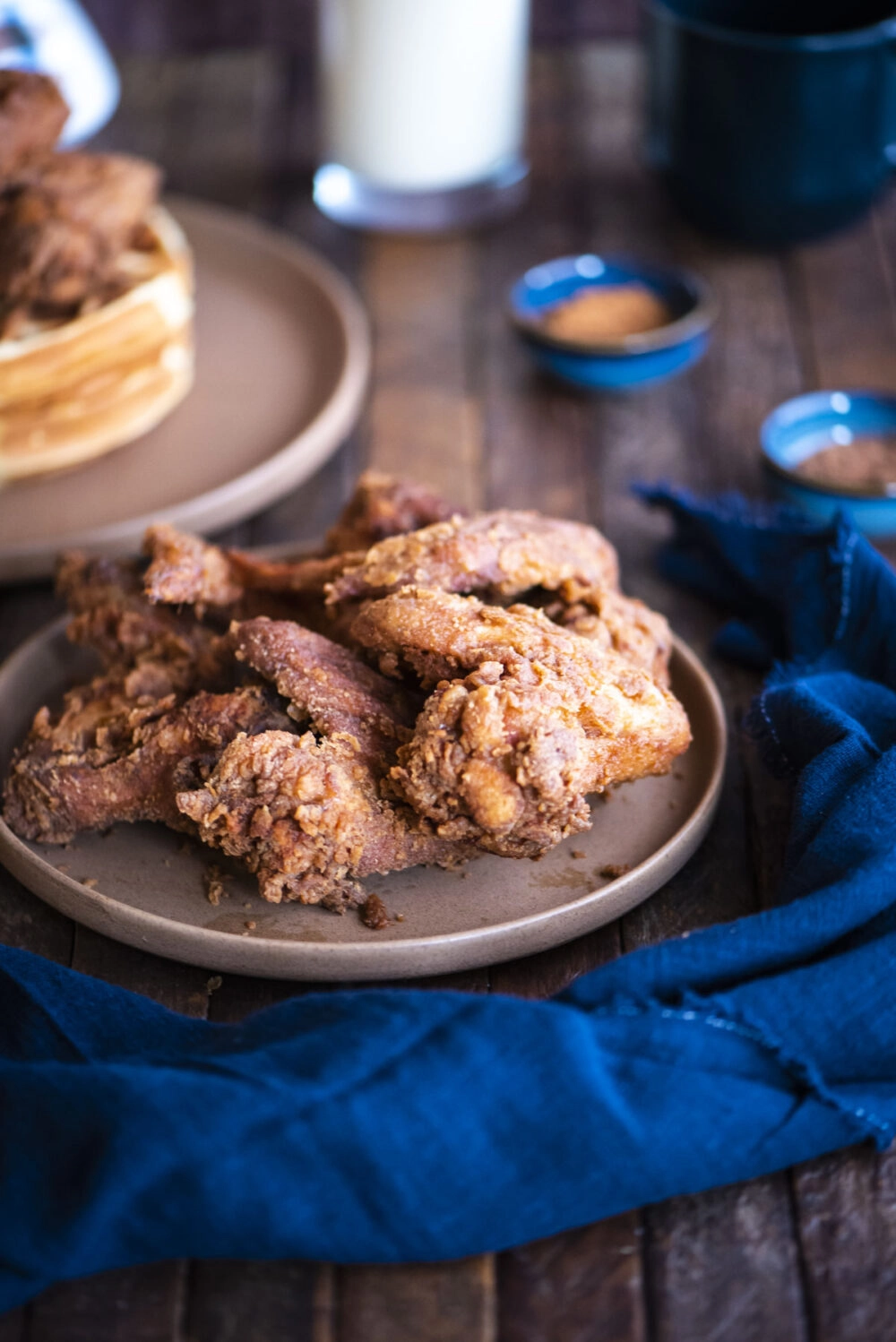 fried eggnog chicken wings on a plate