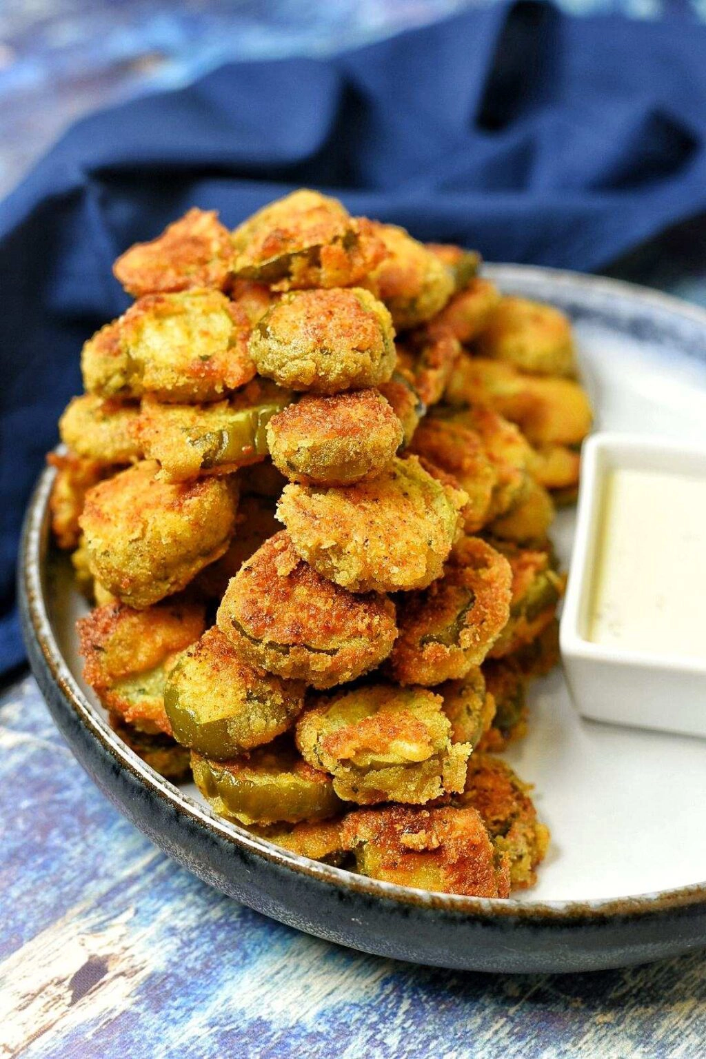 Creole Fried Pickles with a side of -ranch dressing for dipping