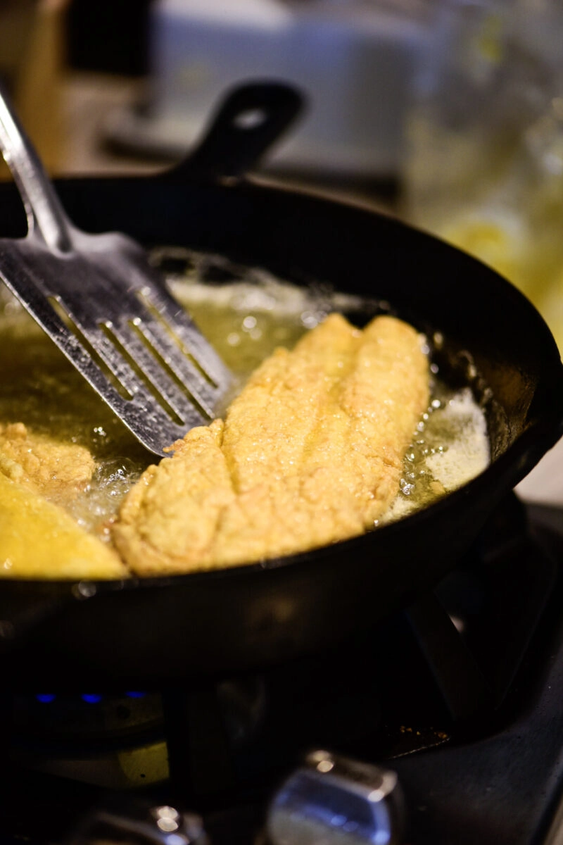Frying fish in cast iron skillet
