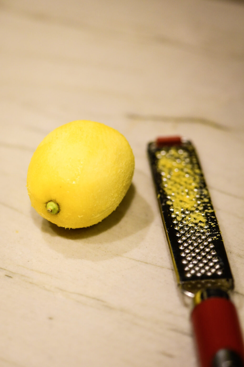 Zesting lemon for lemon cream pie