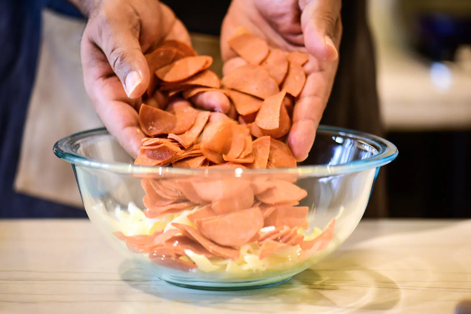 Making calzone mixture using various cheeses and turkey pepperoni