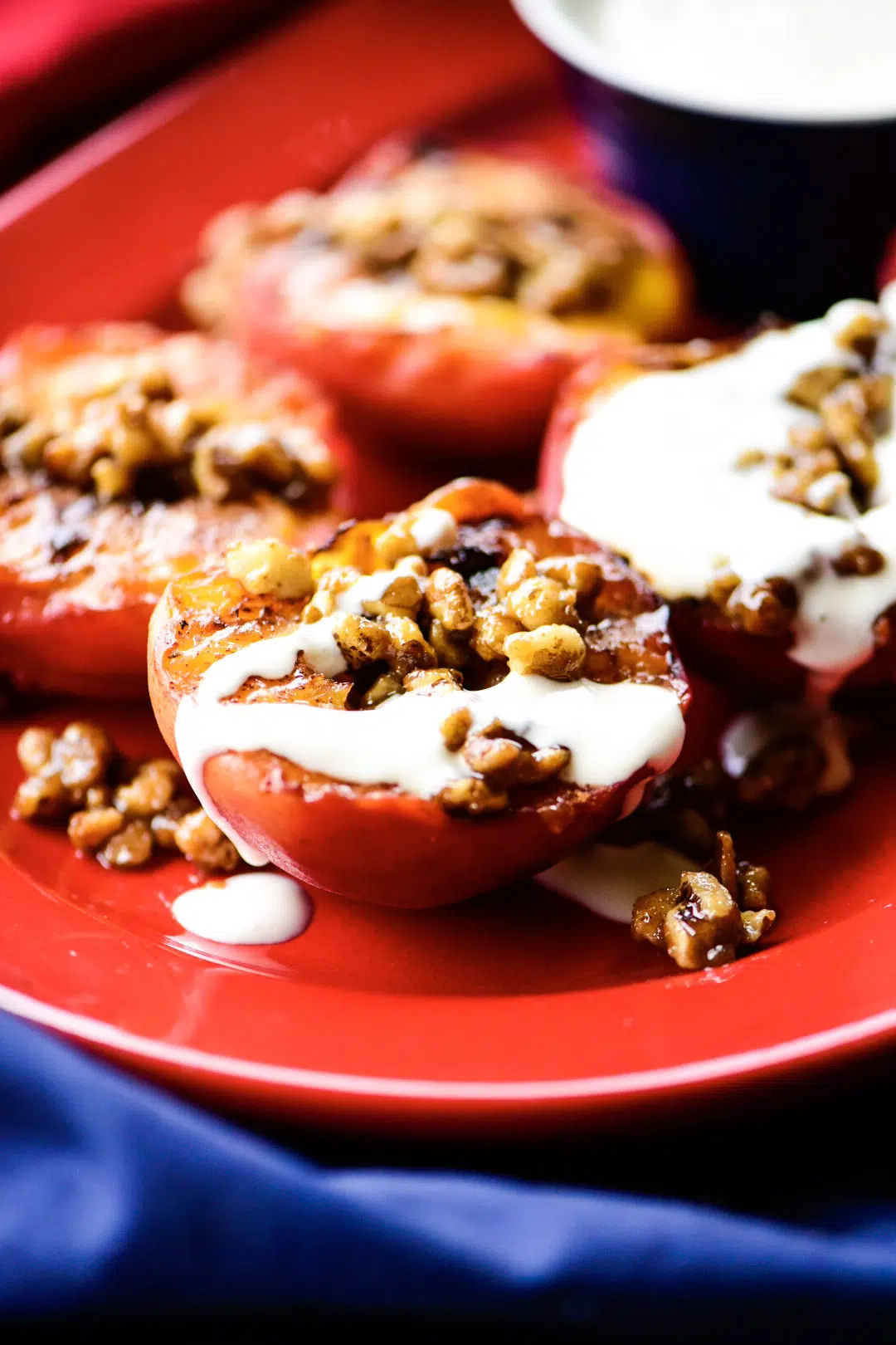 grilled peaches with candies walnuts and cream