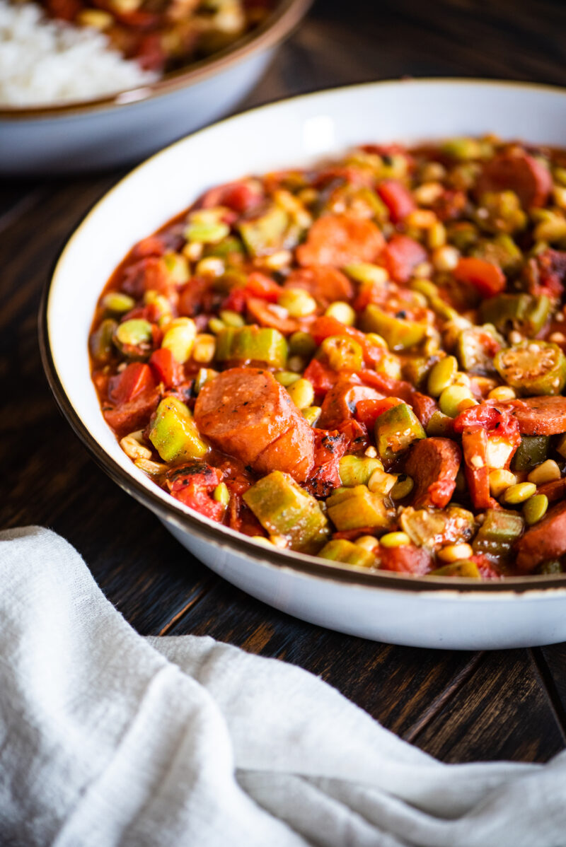 close up shot on chicken sausage in stewed okra recipe