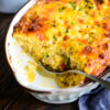 turkey hash brown casserole with large serving spoon