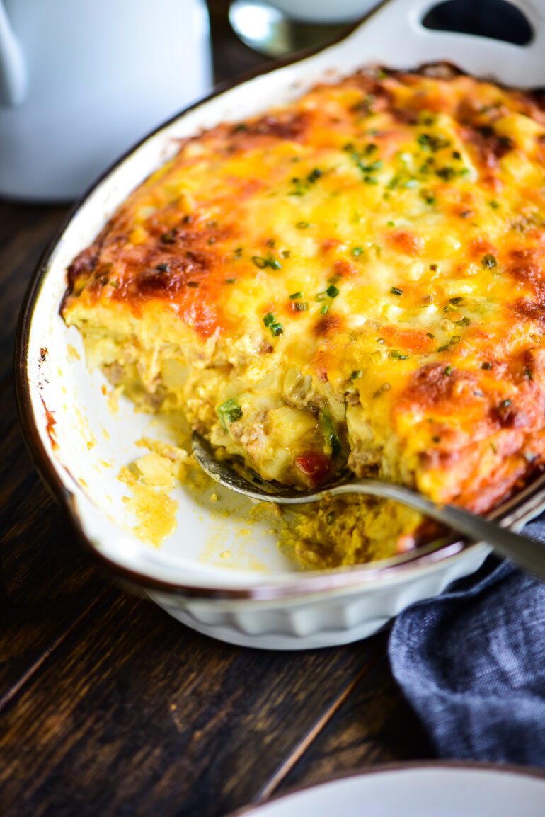 turkey hash brown casserole with large serving spoon