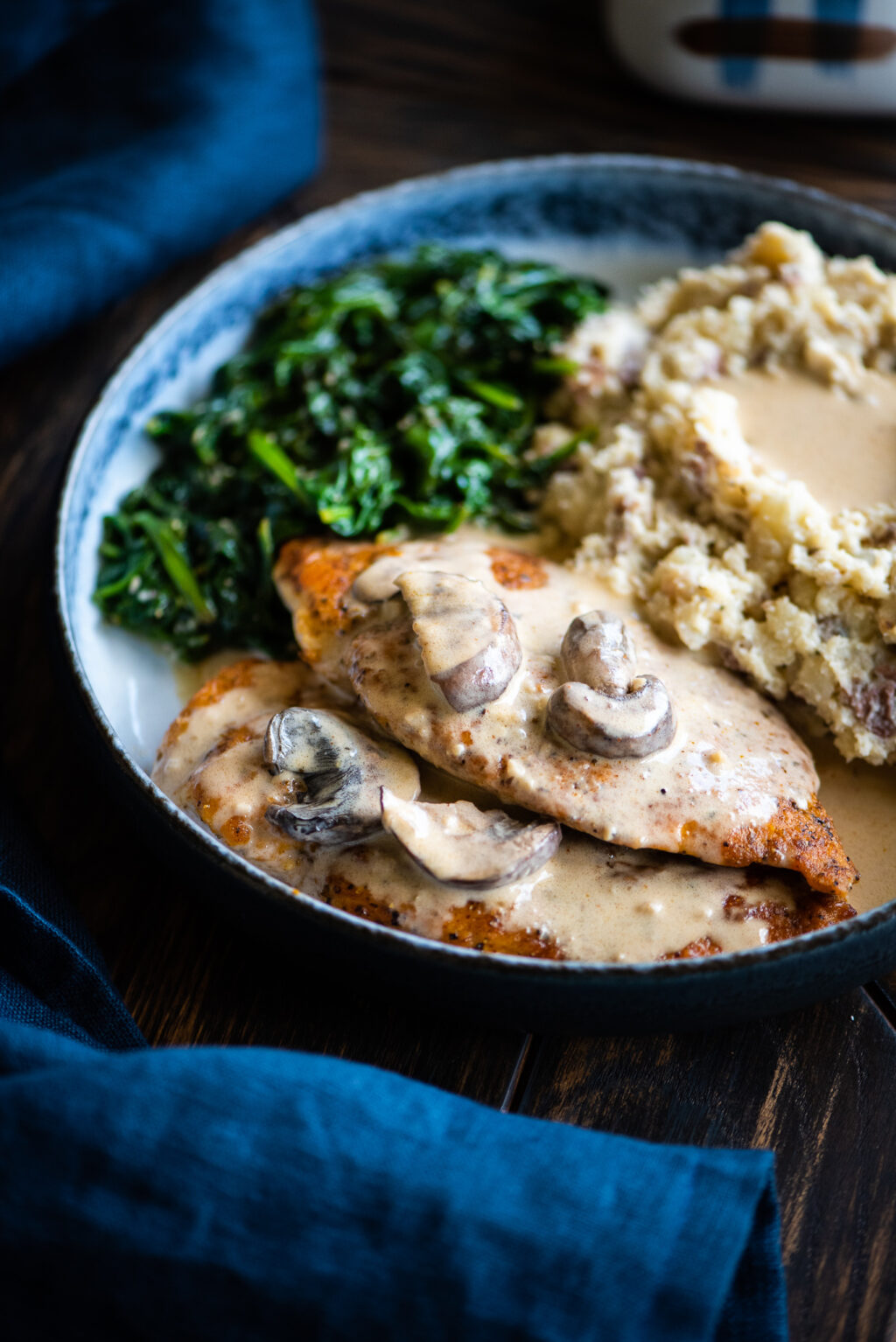 creamy chicken marsala with mashed potatoes and spinach