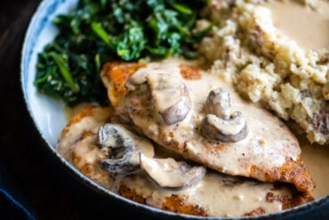 creamy chicken marsala with mashed potatoes and spinach