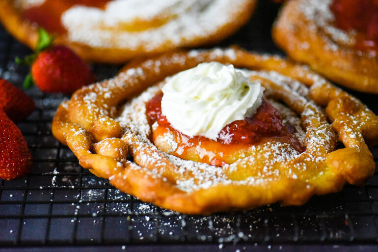 Funnel Cake with Homemade Strawberry Sauce