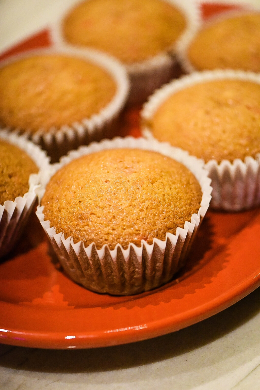 cherry cupcakes fresh out of the oven with no frosting