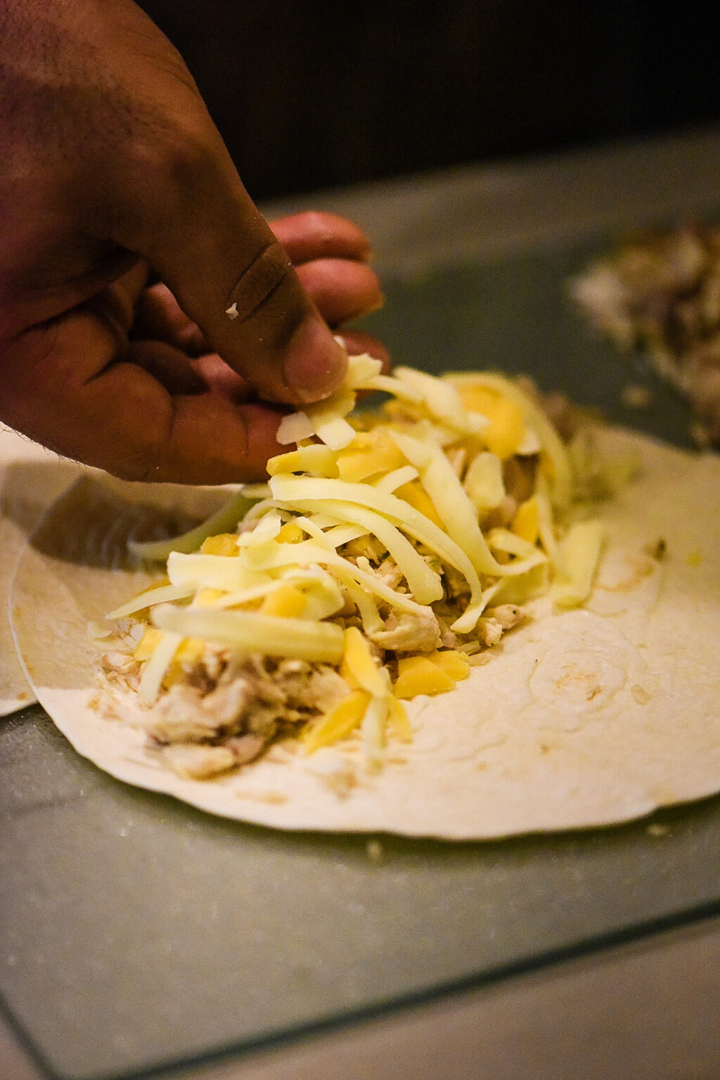 Filling up Shredded Chicken Flautas