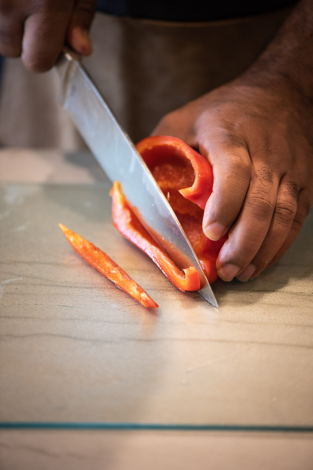 Slicing red bell peppers