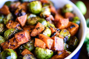 close up of roasted sweet potatoes and Brussels sprouts
