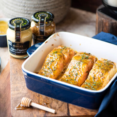 Honey-mustard glazed salmon is baking dish