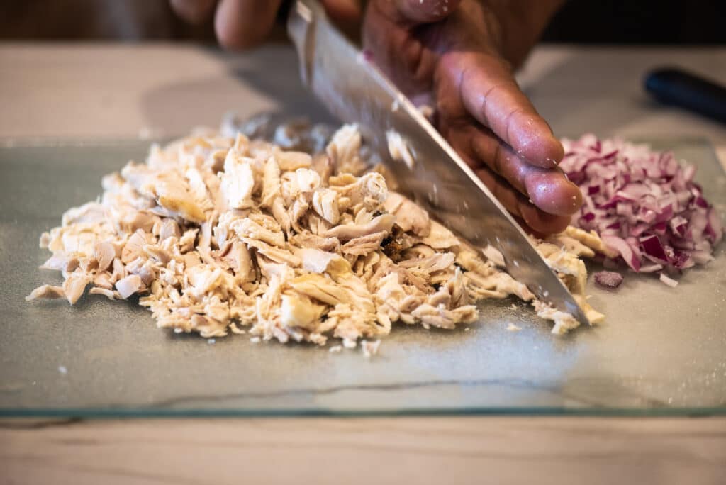 chopping rotisserie chicken