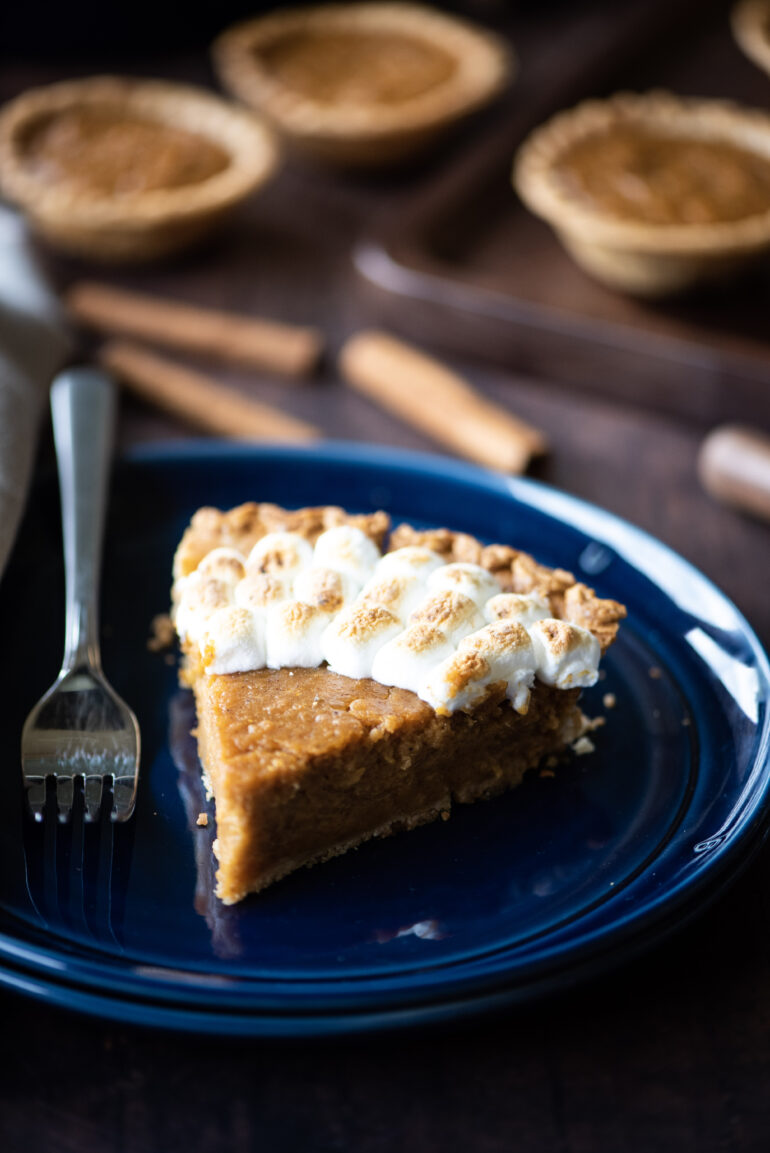 Single slice of sweet potato pie with toasted marshmallows