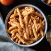 Overhead shot of Penne pasta with vodka sauce
