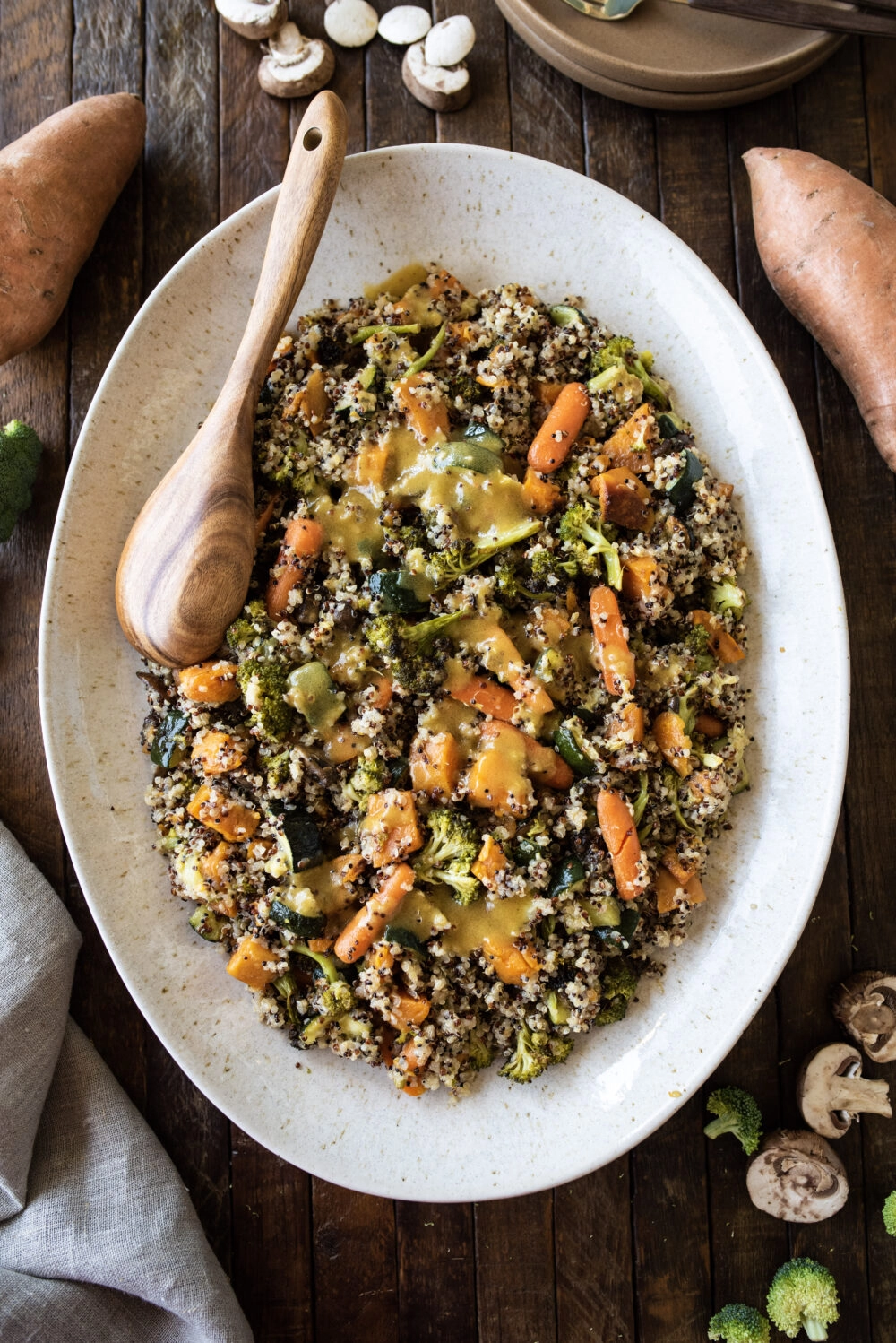 overhead shot of large platter of quinoa and roasted veggies