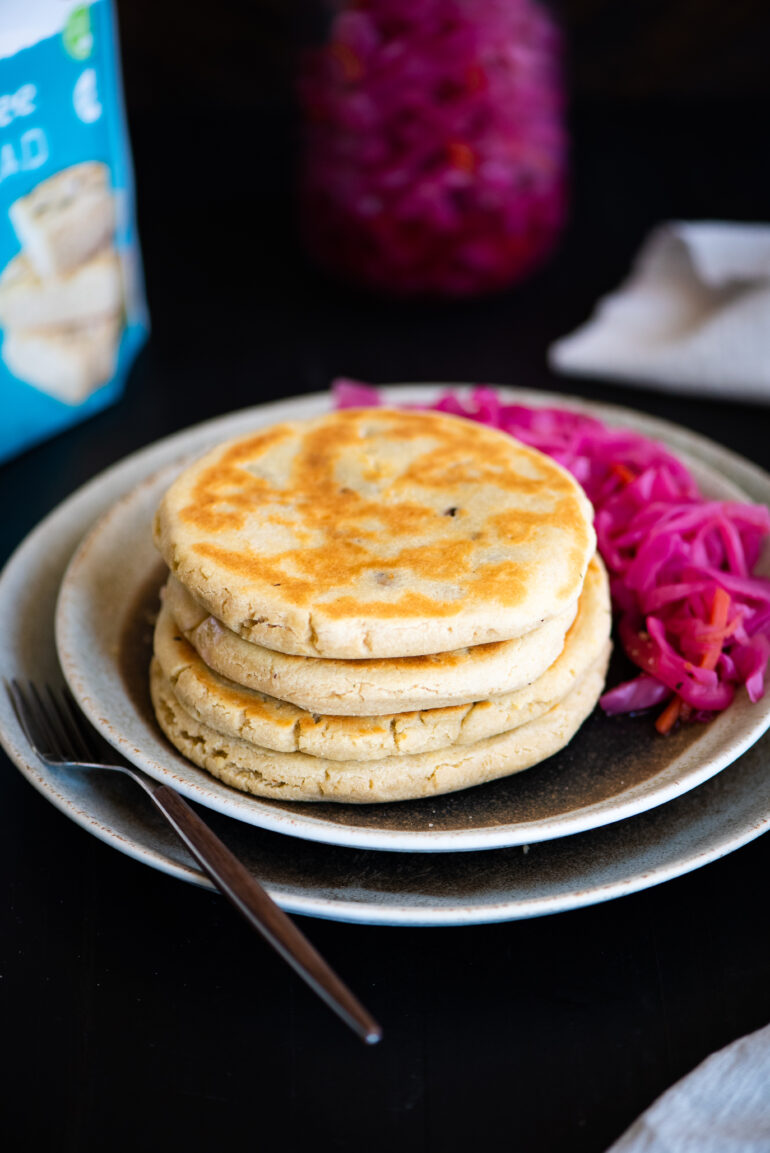 a stack of four pupusas