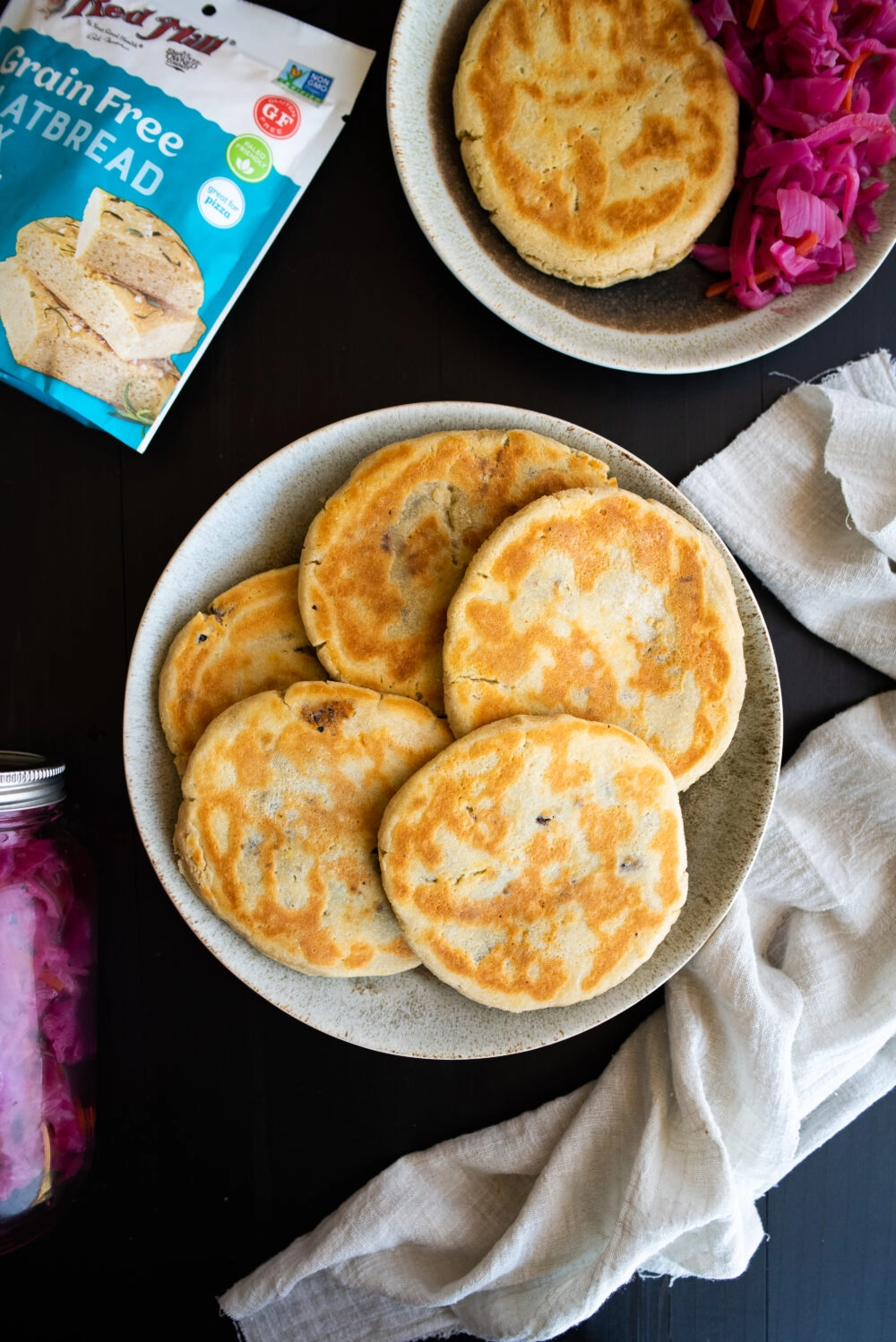 a full plate of pupusas ready to serve