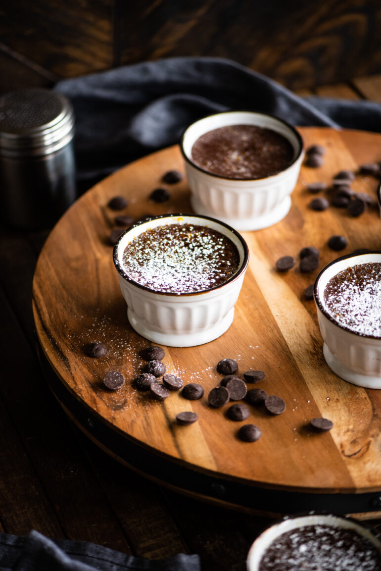 Rameskins of chocolate custard surrounded by dark chocolate chips