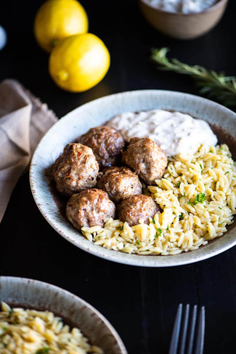 bowl of lamb meatballs and orzo pasta