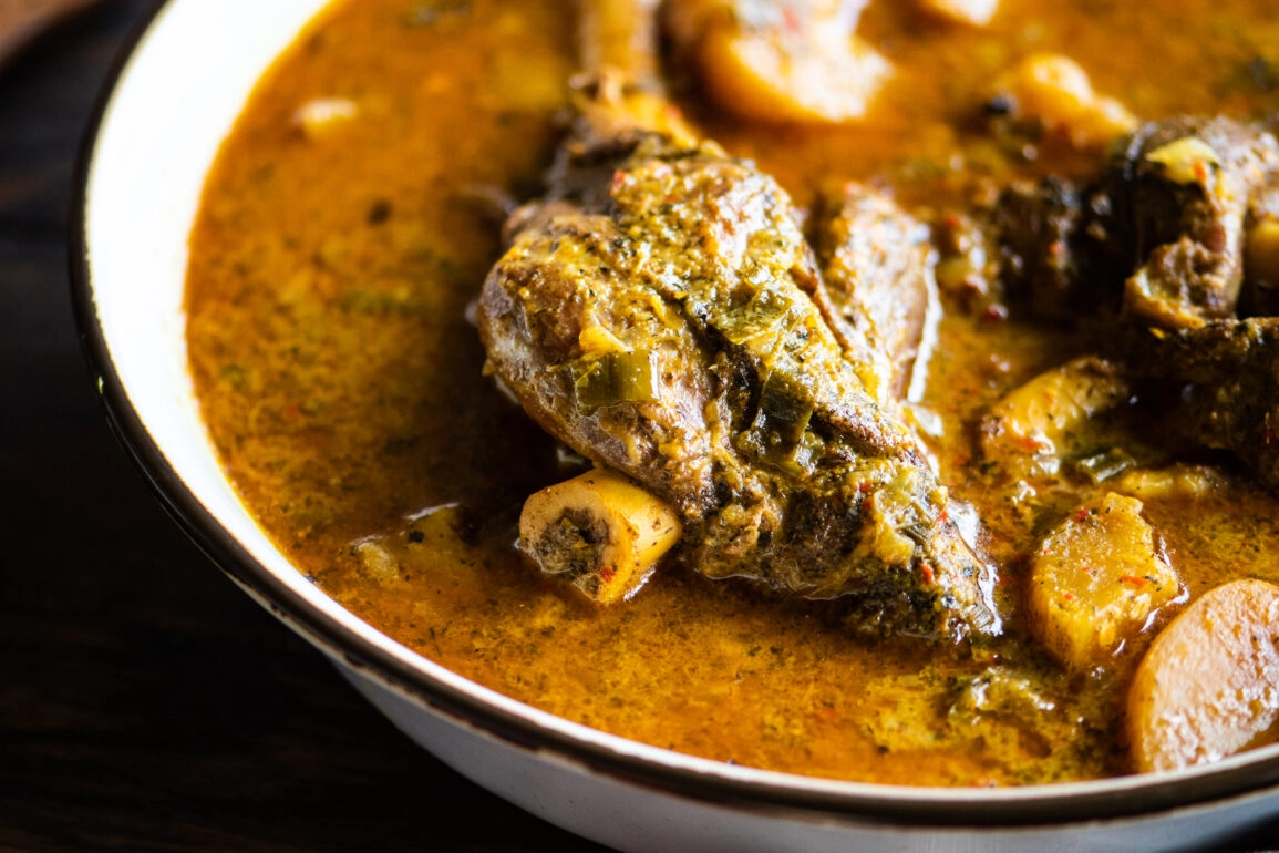 large bowl of curry lamb shanks