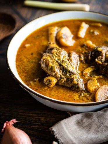 large bowl of curry lamb shanks