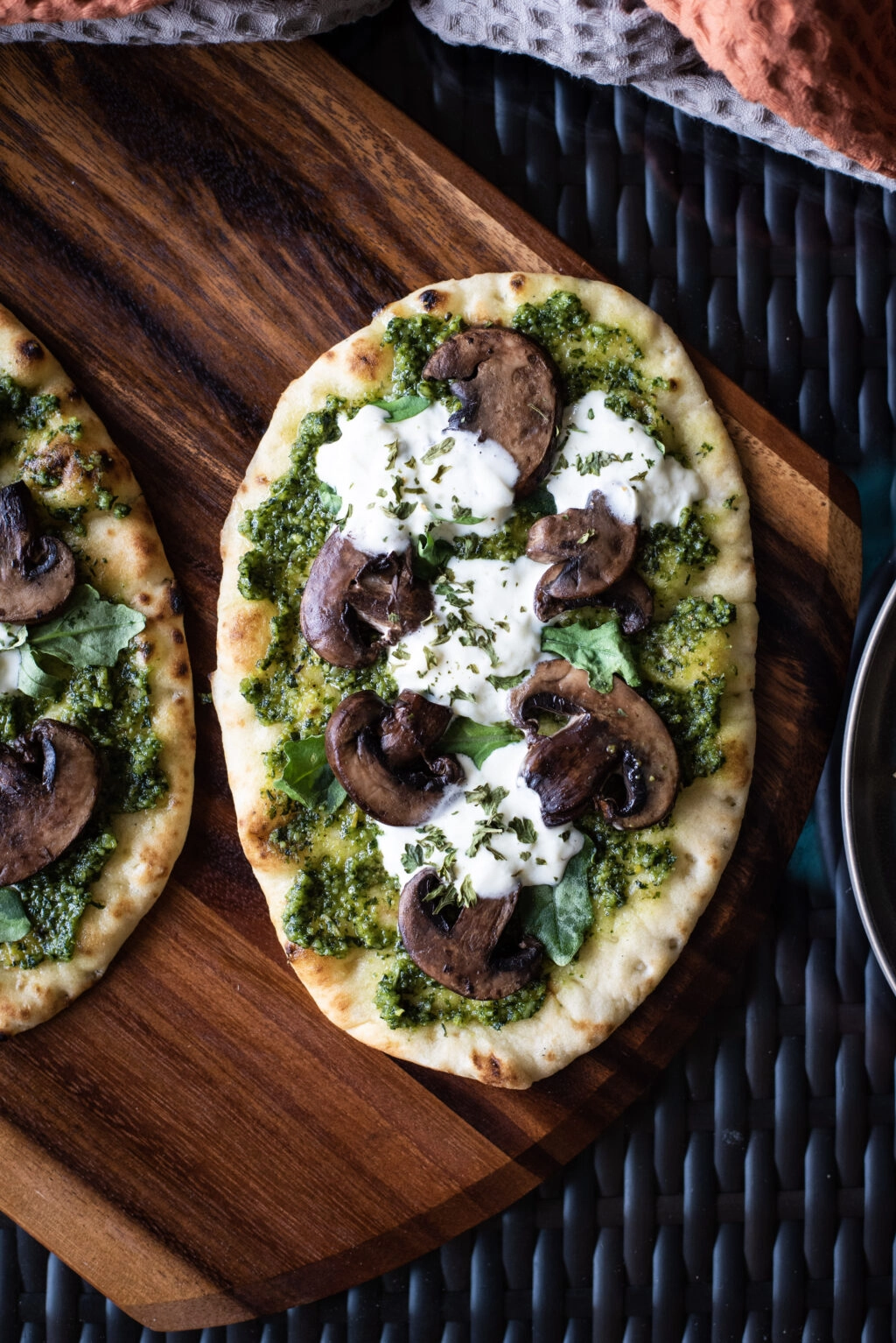 Overhead shot of pesto mushroom flatbread pizza 