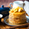 Buttermilk pancake stack topped with caramelized apples