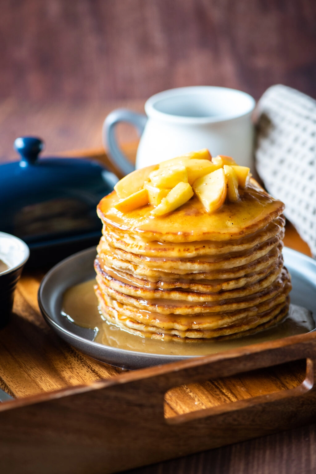 Buttermilk pancake stack topped with caramelized apples