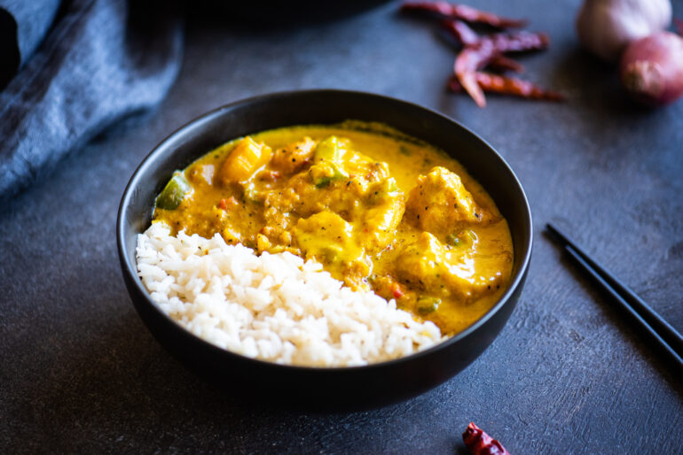 bowl of yellow fish curry