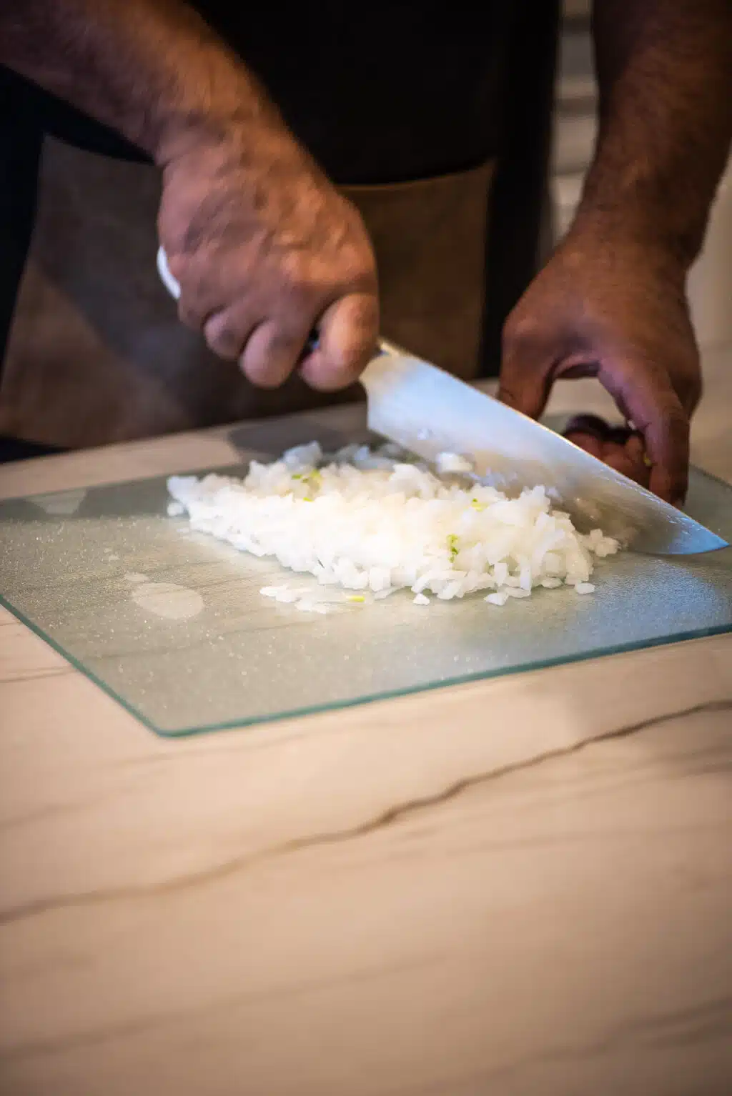 chopping raw white onions