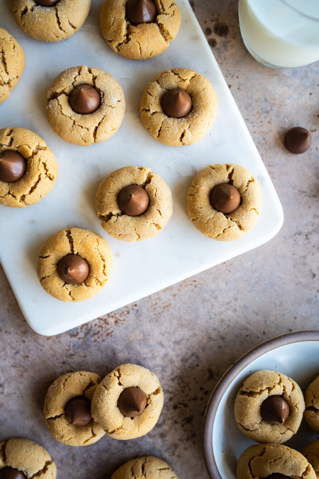 overhead shot of a dozen peanut butter blossom cookies