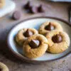 peanut butter blossom cookies served on a plate