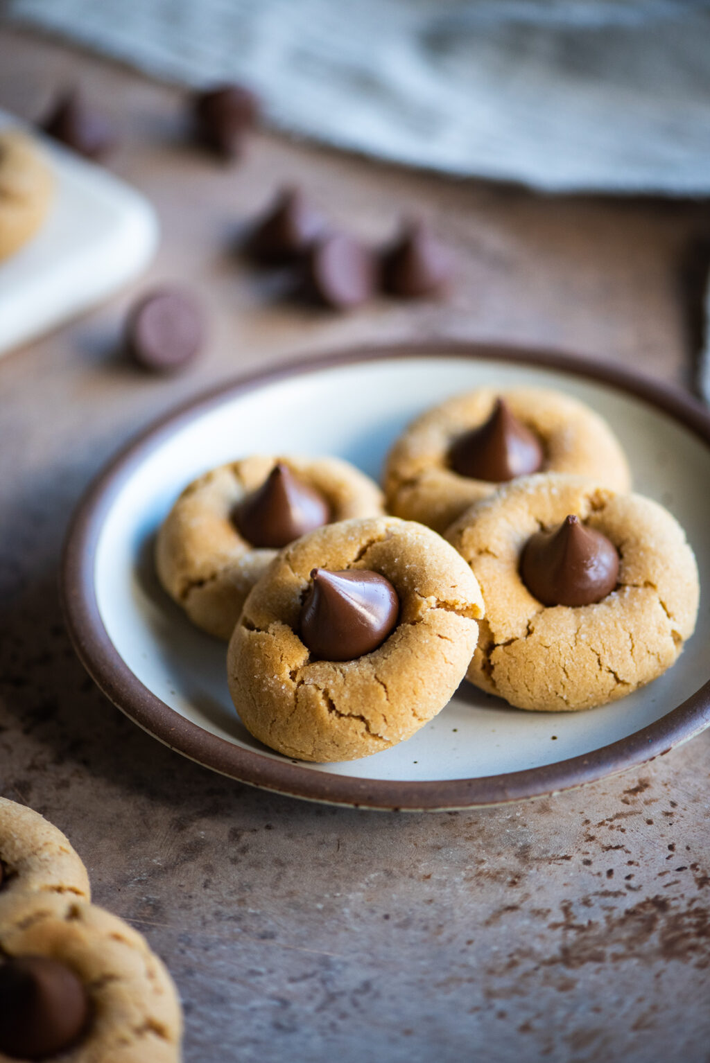 peanut butter blossom cookies served on a plate