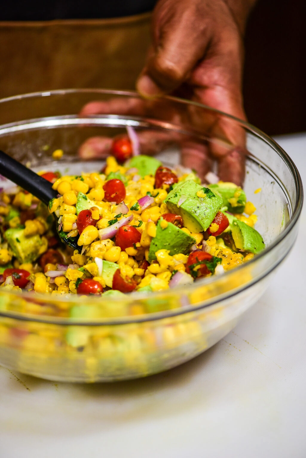 making homemade corn salsa