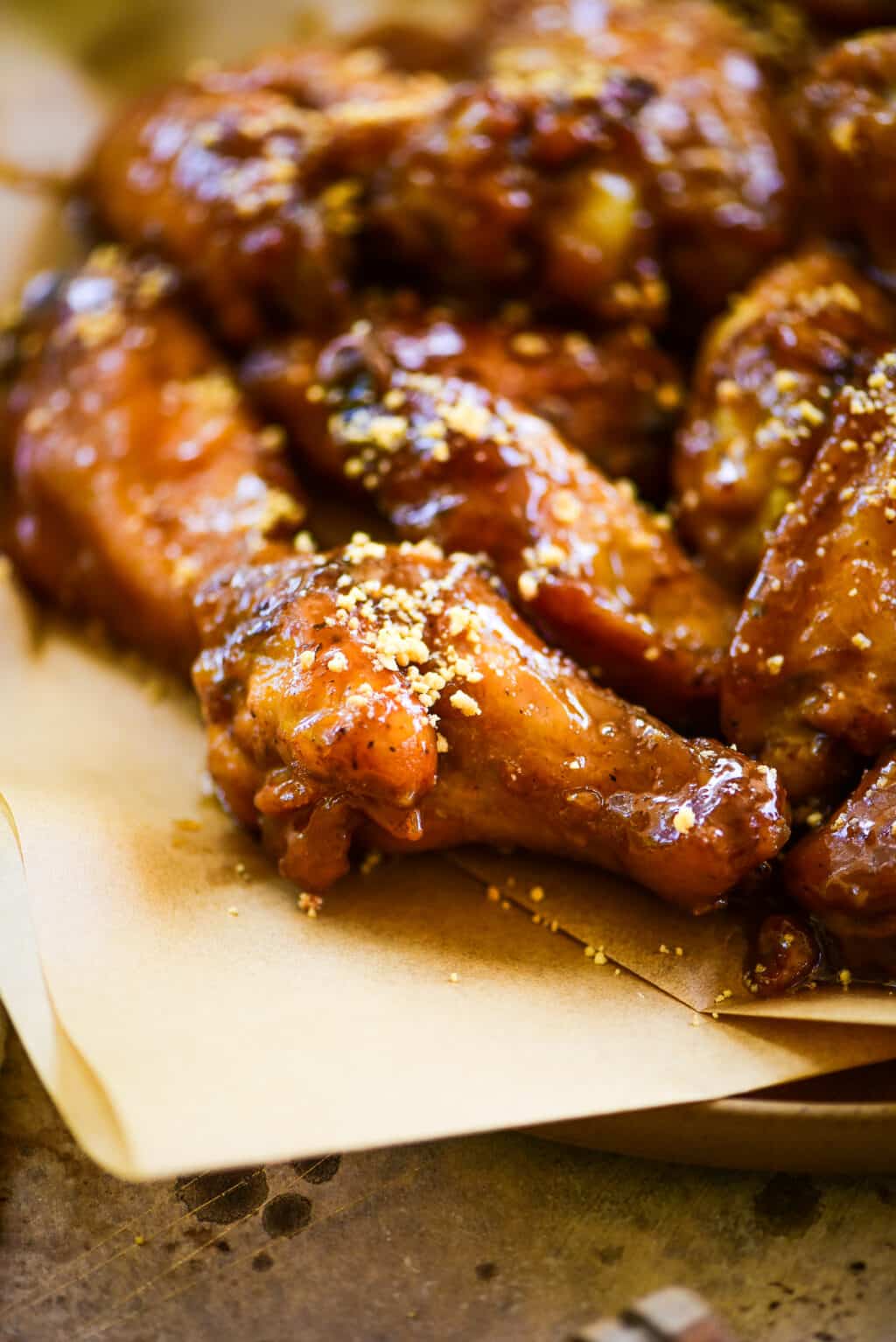 honey peanut butter wings sprinkled with crushed peanuts