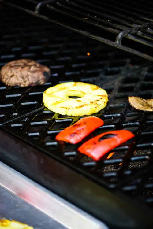 grilling vegetables and fruit on the grill
