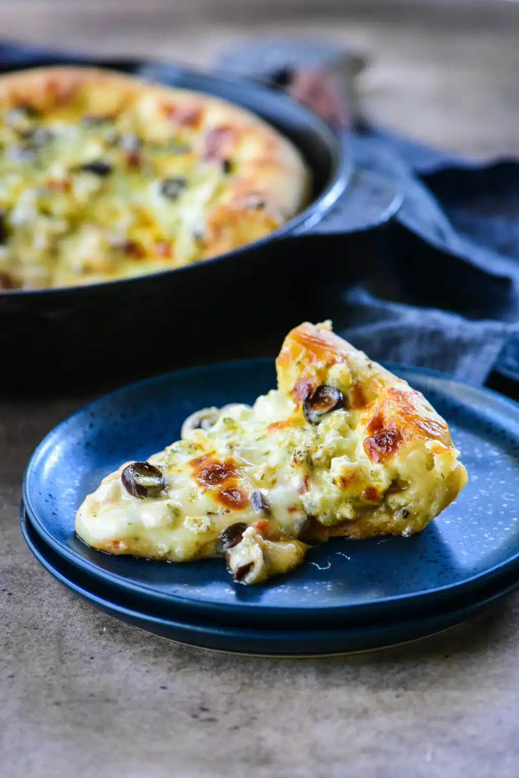 single slice of cast iron chicken pizza