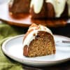 single slice of hummingbird bundt cake on a white plate