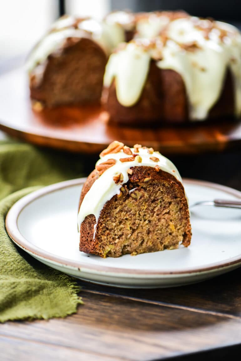 single slice of hummingbird bundt cake on a white plate