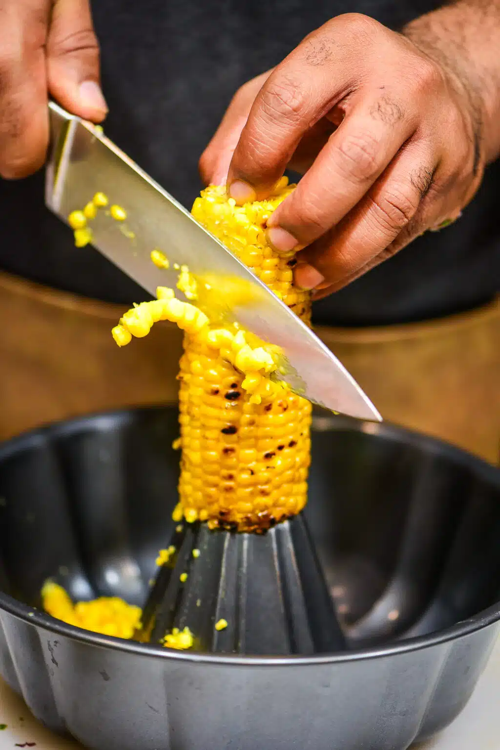 shucking grilled corn