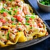 sheet pan of chicken enchilada nachos