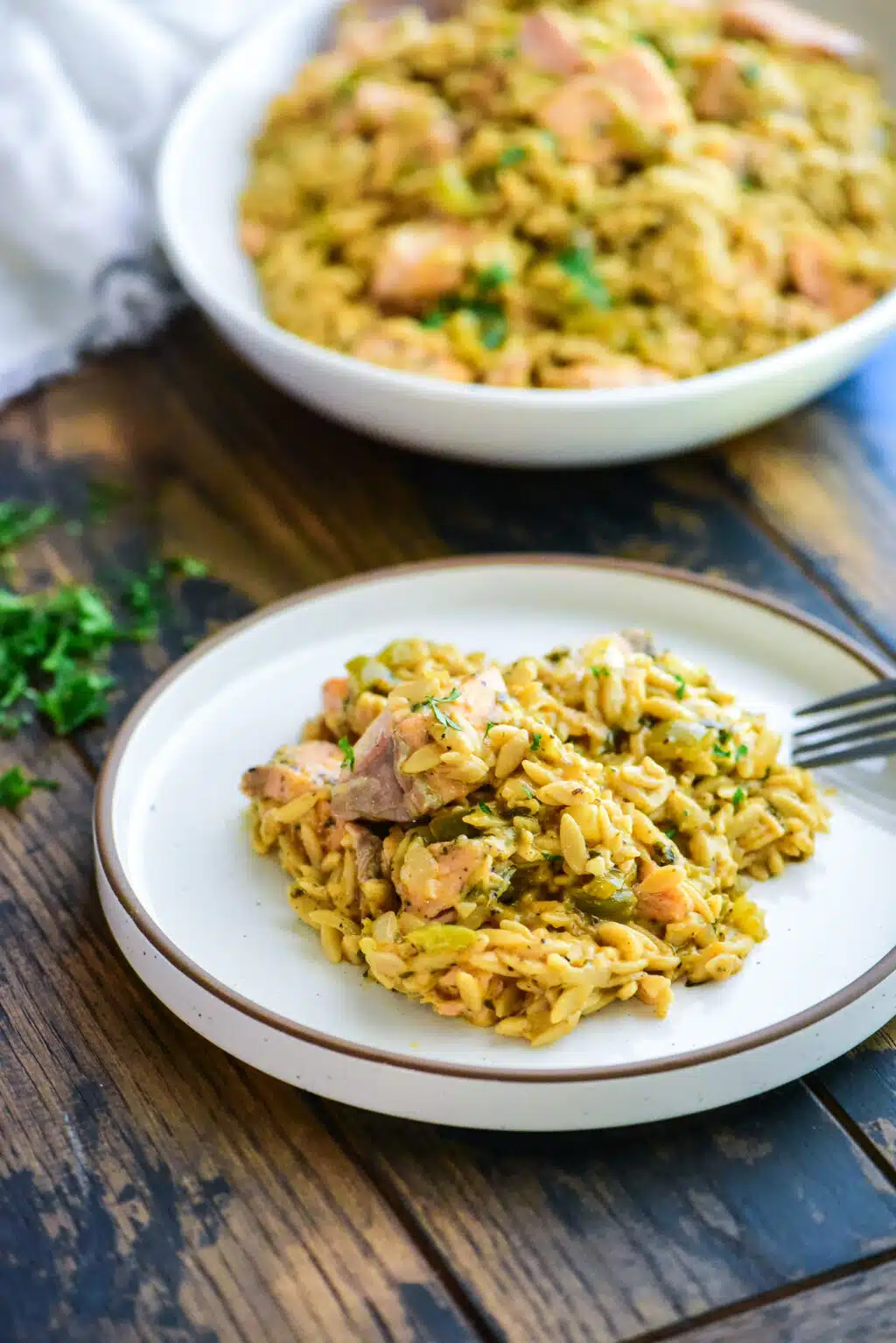 cajun salmon orzo on a small plate