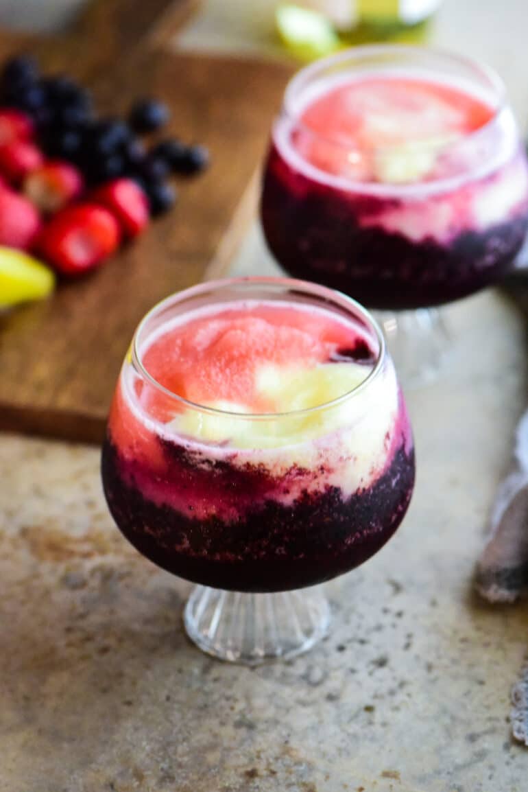two glasses with frozen wine slushies