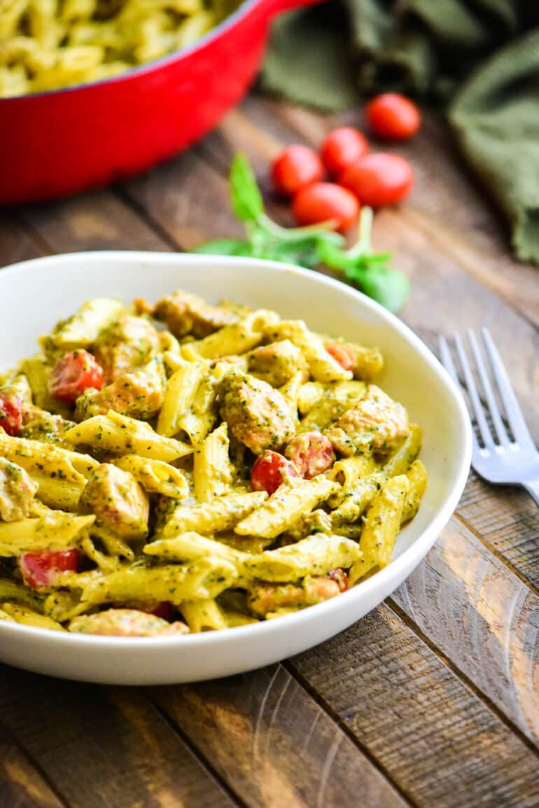 individual serving bowl of creamy pesto pasta