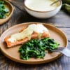 seared salmon and creamy mustard sauce served with sauteed spinach