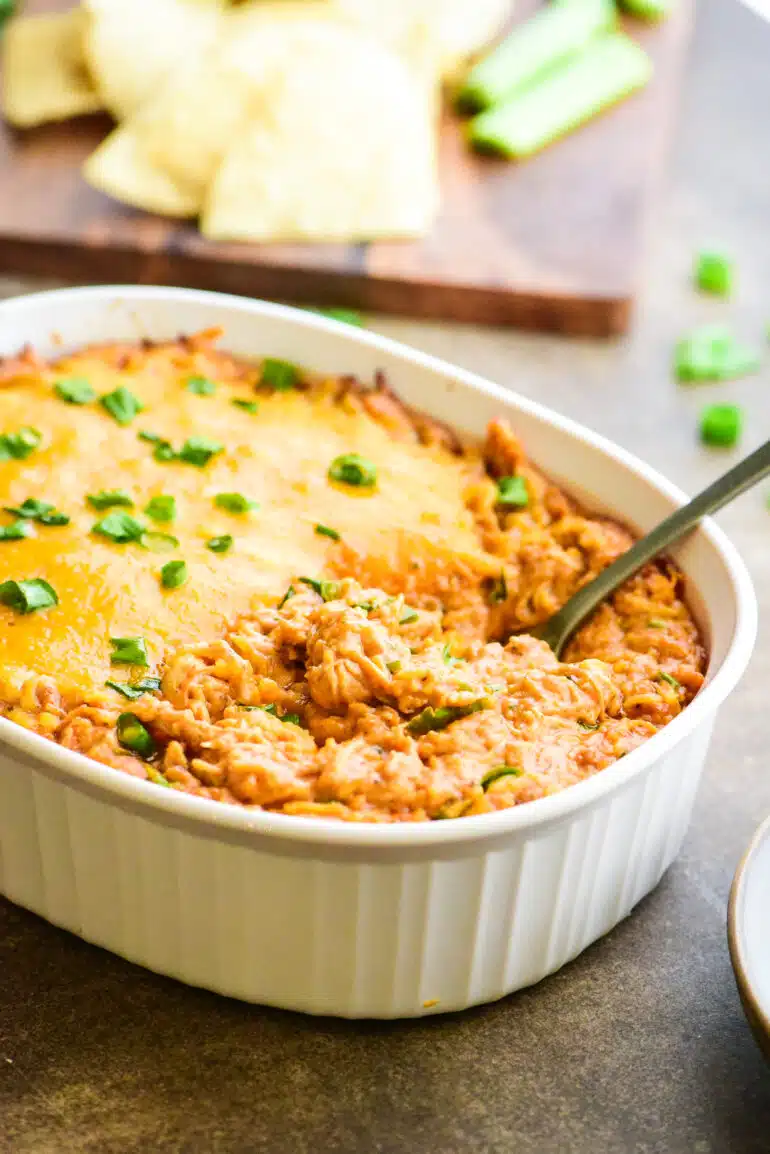 honey bbq chicken dip in a casserole dish