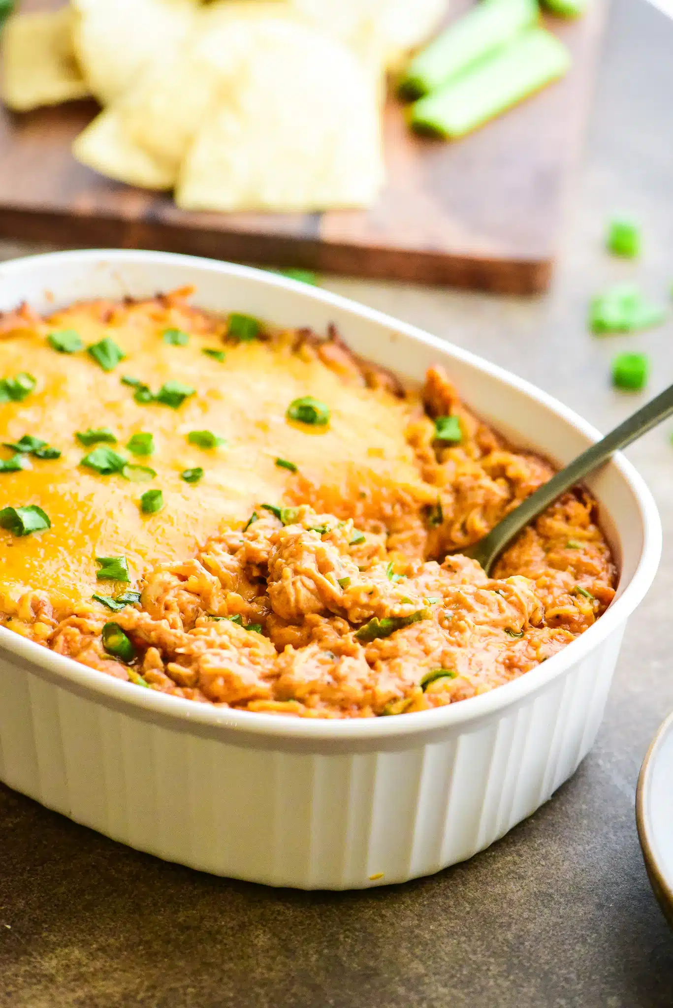 honey bbq chicken dip in a casserole dish