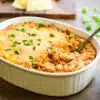 honey bbq chicken dip in a casserole dish